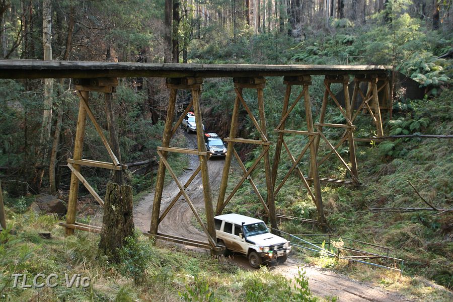 03-Kirrama drives under the trestle bridge.JPG